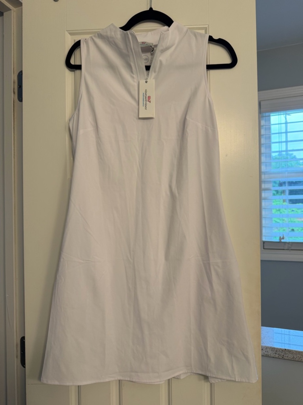 Sleeveless White Performance Golf Dress with Zip Neck